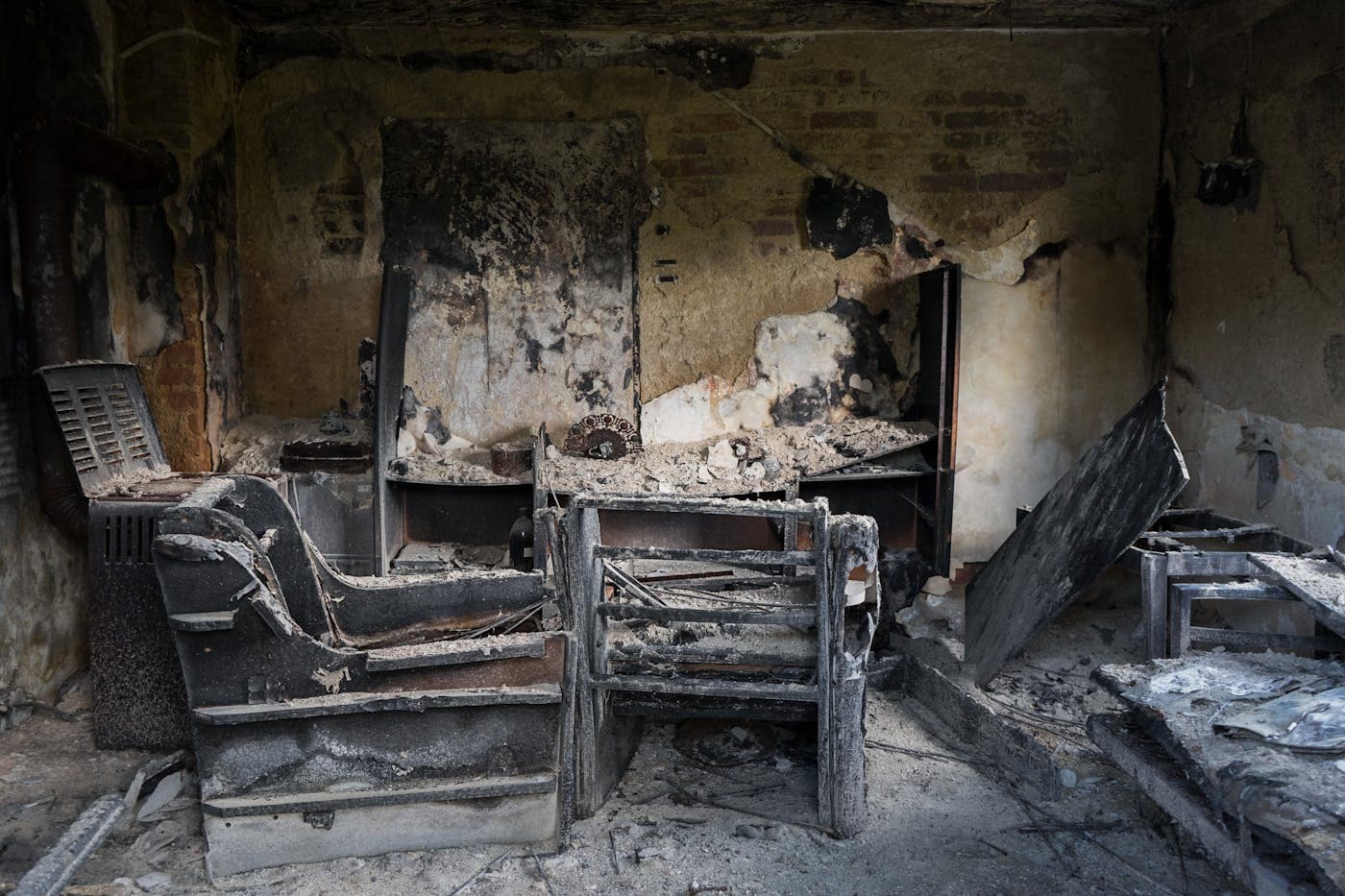 Burned interior space illustrating fire damage restoration work